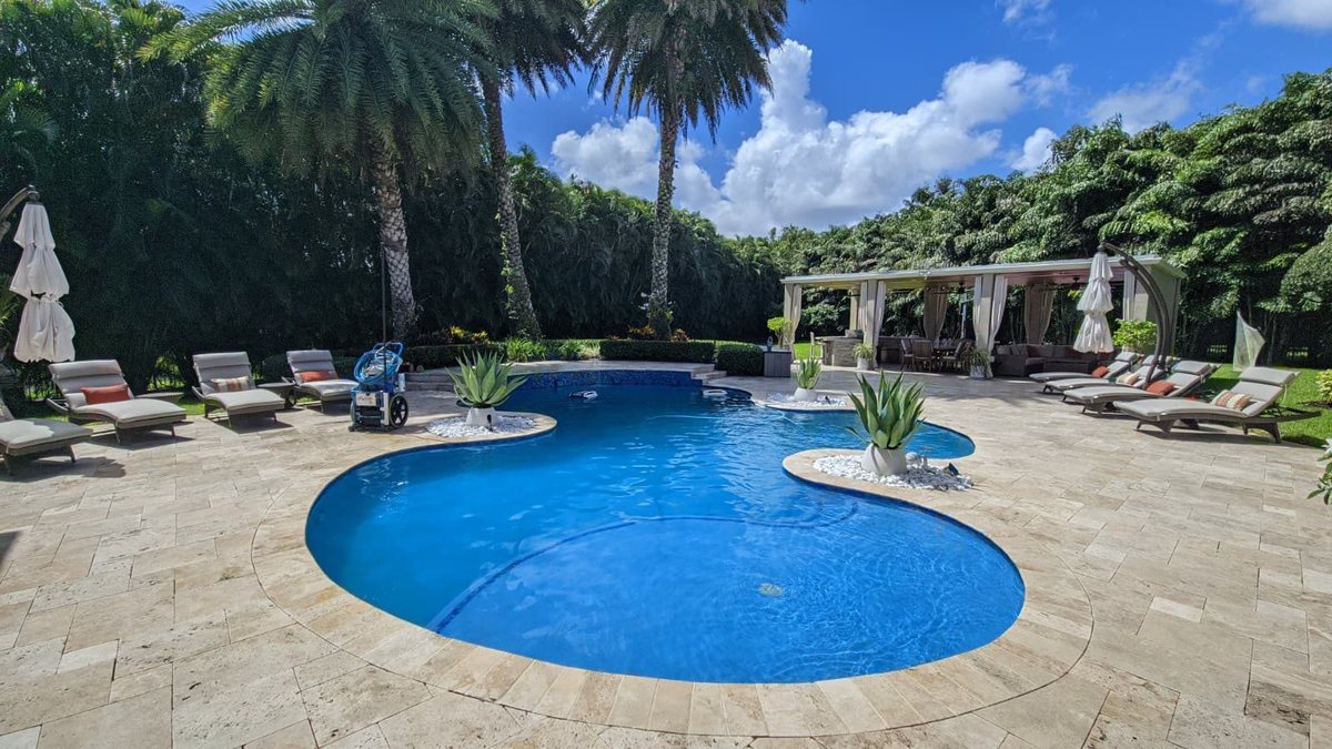 Clean swimming pool serviced in Boca Raton, Florida